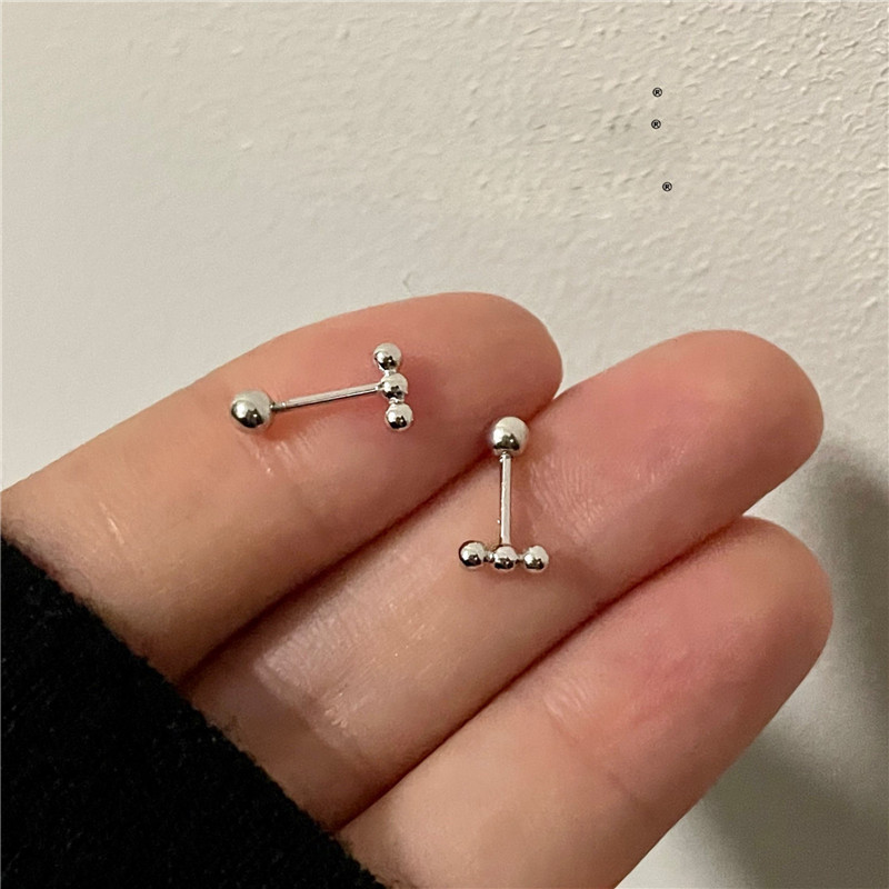 Pendientes de cuentas redondas para mujer, pendientes con hebilla de tornillo, pendientes de piercing de oreja de moda, pequeños, exquisitos, modernos y personalizados, uñas de hueso del oído de alta gama