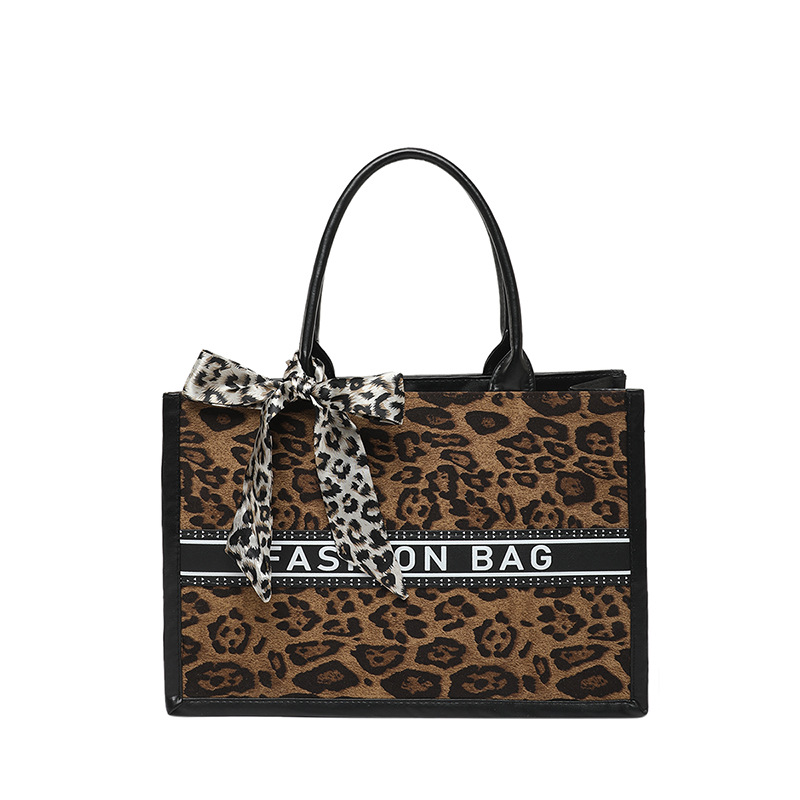 Primavera nueva moda estampado de leopardo de alta capacidad bolso de hombro de estilo extranjero bolso de viaje de nicho para mujeres