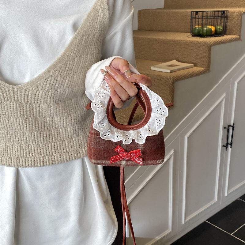 Dolce encaje de niña bolso de hombro, bolso de mini bebé, bolso de otoño y invierno, nuevo tipo de bolso para niños