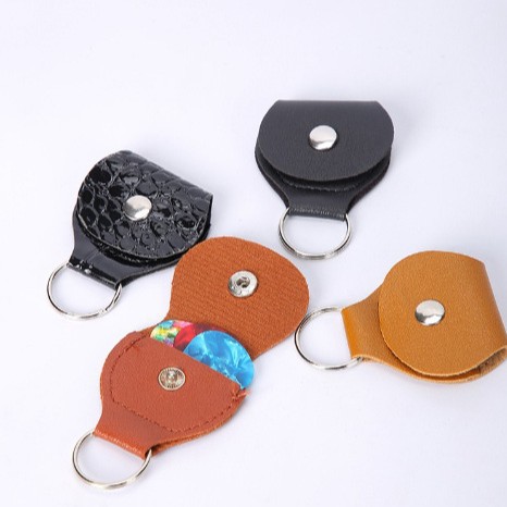 Pick clip Tipo de guitarra de cuero genuino de LA PU multi-color opcional portátil multi-función de ventas directas de la fábrica