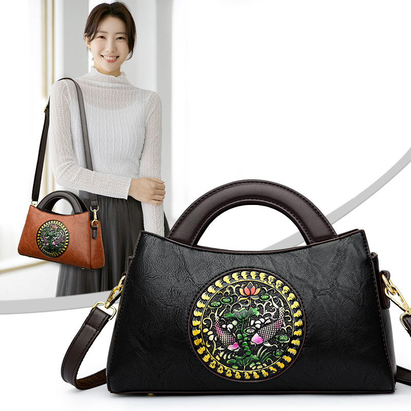 Bolso de mujer 2023 nuevo estilo nacional artístico costura moda mujer bolsa de sillín portátil hombro bolsa de mensajero al por mayor