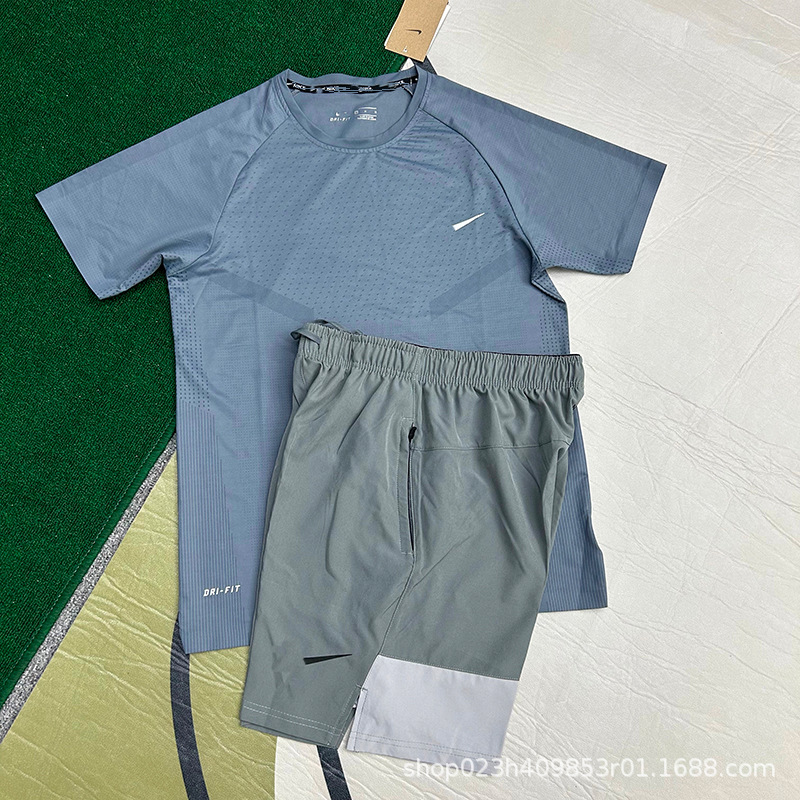 Nuevo al por mayor movimiento de secado rápido transpirable hombre camiseta de manga corta entrenamiento de hielo suelta chaqueta casual fitness correr