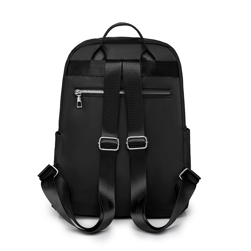 Mochila de mujer salvaje 2024 nueva mochila de viaje resistente al desgaste impermeable de gran capacidad bolsa de nailon al por mayor