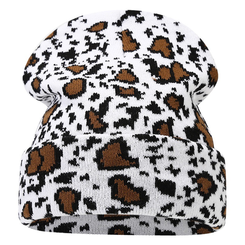 Moda europea y americana Nueva leopardo Jacquard sombrero de punto engrosado cálido hombres y mujeres otoño e invierno Gran circunferencia de la cabeza protección del oído sombrero de lana