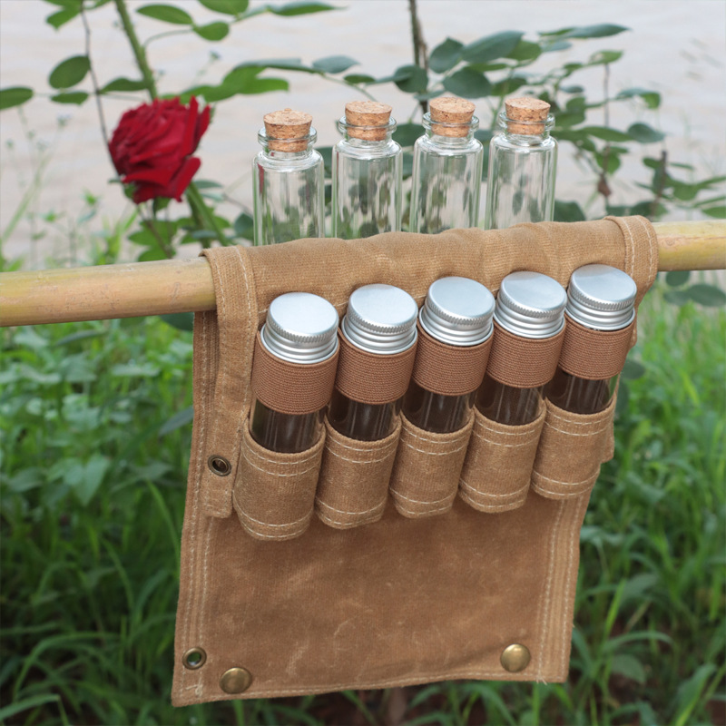 Outdoor-Camping-Flaschenset mit 9 Glasflaschen, faltbarem Gewürzbeutel, Canvas-Tasche (Großhandel)_voghion.com