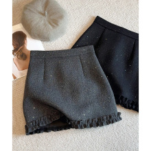 亮闪闪星空呢子半身裙女2025秋冬新款木耳边裙摆a字包臀毛呢短裙