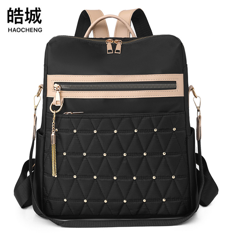 Bolsos para mujer 2023 nueva mochila casual para mujer de nailon Mochila de viaje al aire libre simple y ligera urbana al por mayor