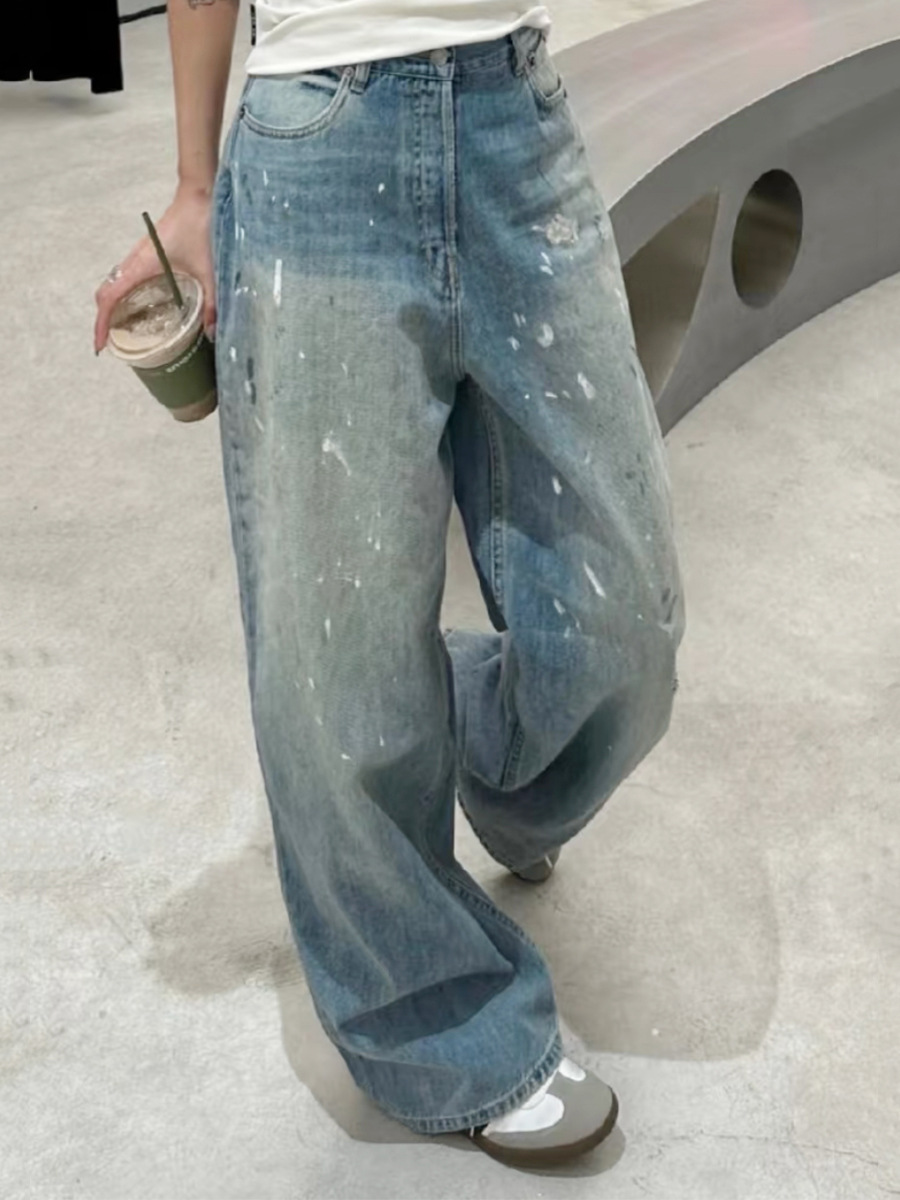クロスボーダーのトレンディなAC手描きのスプラッシュインクのほつれ加工のウォッシュ加工のダメージ加工のパンツ、男性と女性用、ゆったりと多用途、軽くて豪華なワイドレッグジーンズ