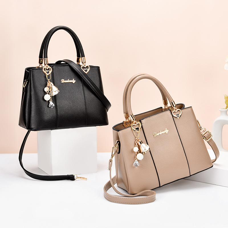 Bolso grande de las mujeres del fabricante nuevo bolso ocasional simple bolso de las mujeres de mediana edad bolso de la madre bolsa de mensajero del hombro del todo fósforo