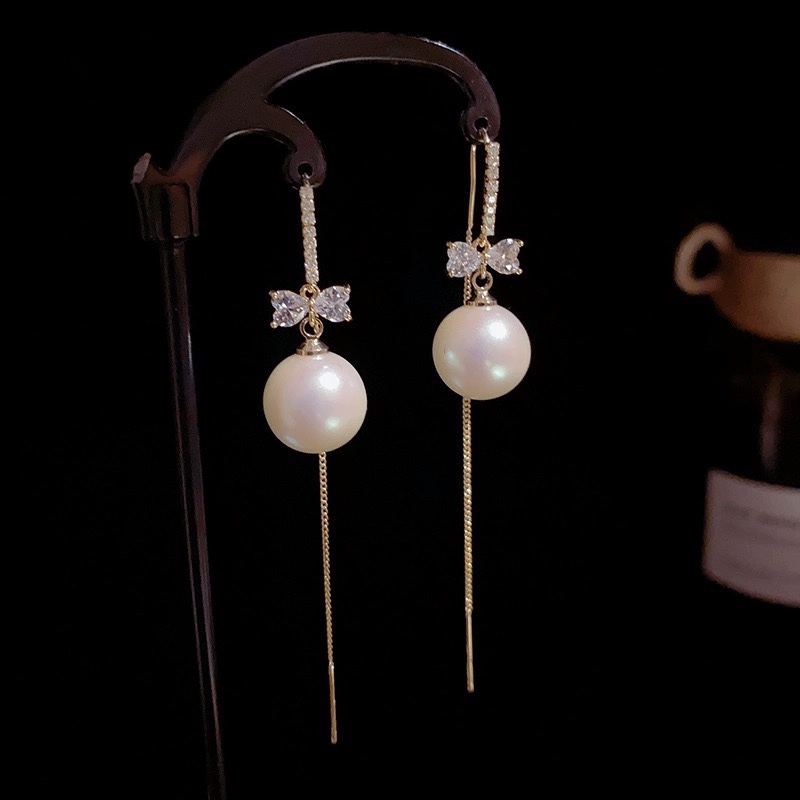 Retro small design cute earrings with bow with zircon pearl with…