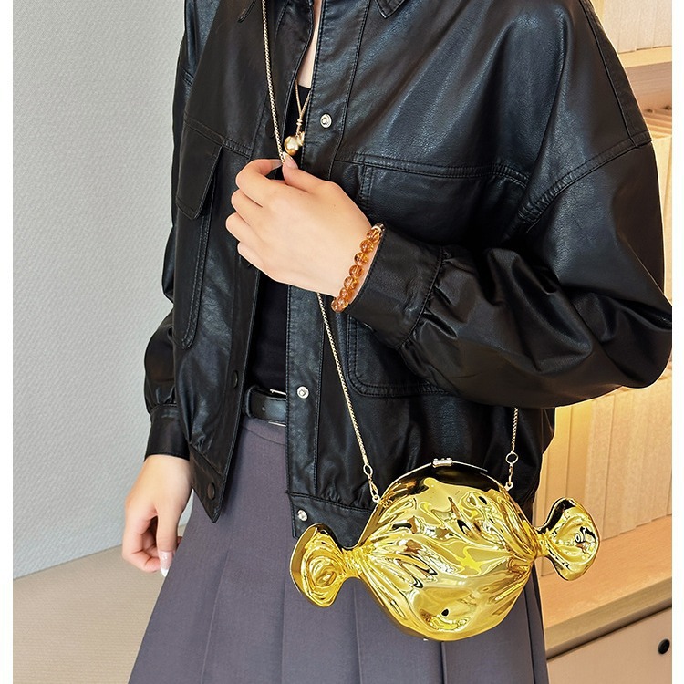 Bolsa de cena de lujo ligera transfronteriza cara brillante personalidad forma de caramelo bolso de mochila moda acrílico cadena bolso de noche mujer