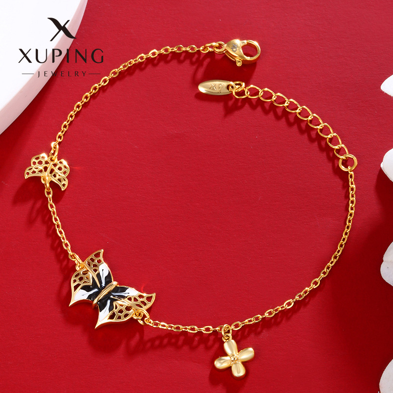 Xuping aleación de cobre dorado esmalte goteo de aceite pulsera mariposa mujer retro lujo ligero nicho diseño de alta sensación joyería