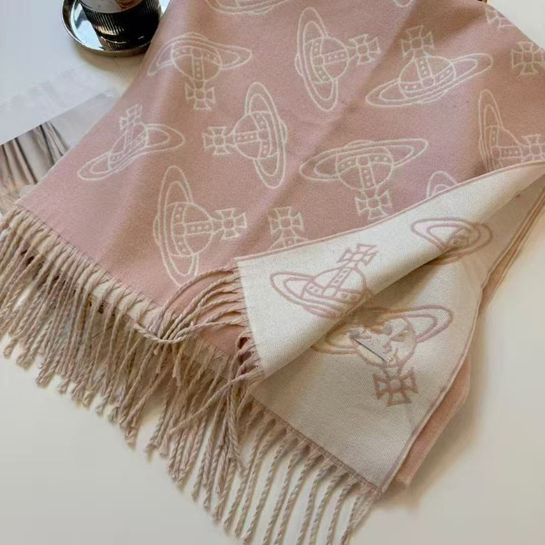 New West Queen cashmere scarf, featuring a Saturn print on both sides, a warm and versatile autumn/winter shawl with tassels