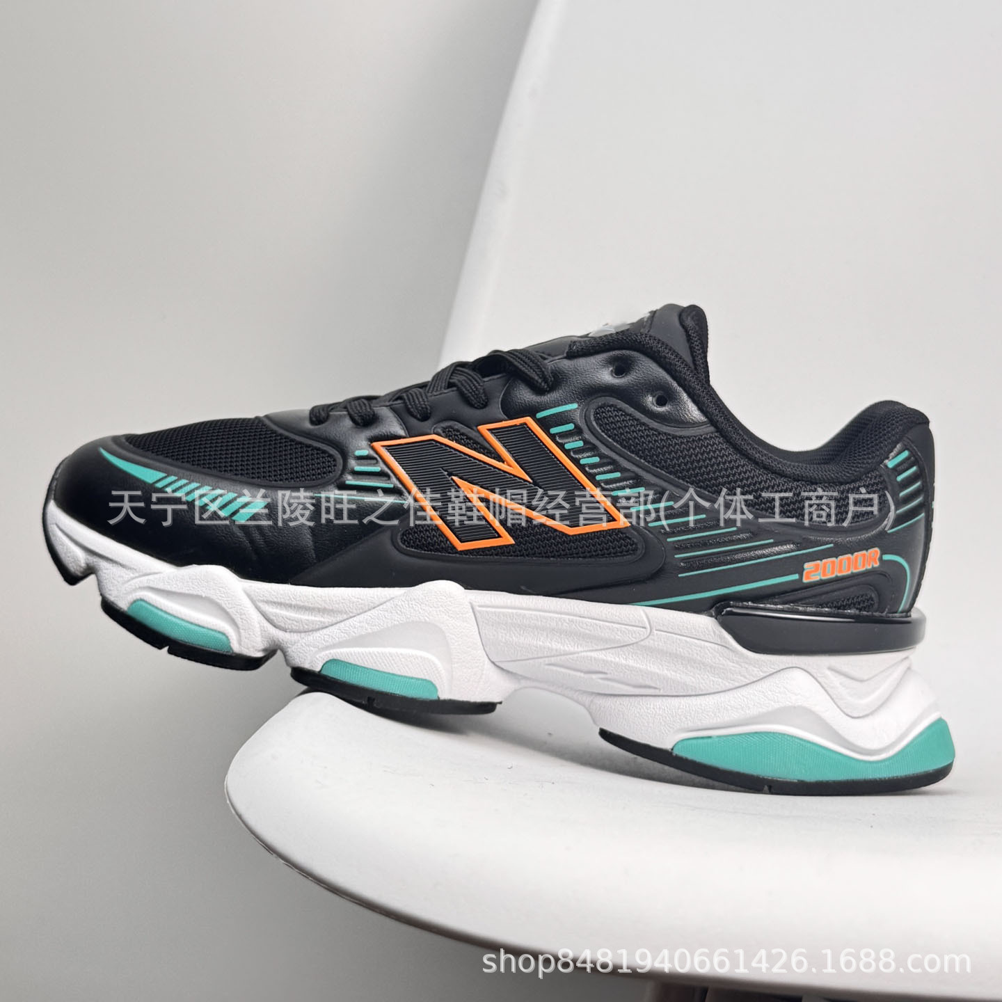 Putian NB M2000 serie de moda versátil tela de cuero artificial de cerdo amortiguador antideslizante desgaste zapatillas de correr bajas