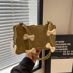 フランス式の小衆のシングル肩の脇の下で女性の新型のファッション的な手提げの棒を包んで高級な洋風の通勤して蝶結びを包みます。