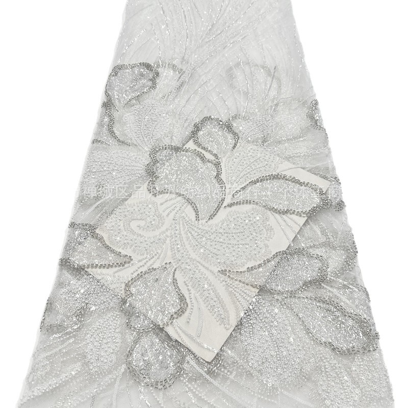Tejido de encaje bordado de moda europea y americana vestido de cena francés vestido de nicho de diseño de tela