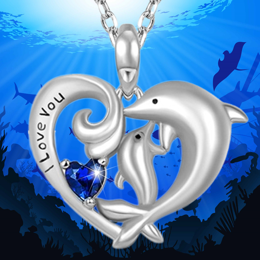 Collar con colgante de delfín y corazón en cristal azul mujer_voghion.com