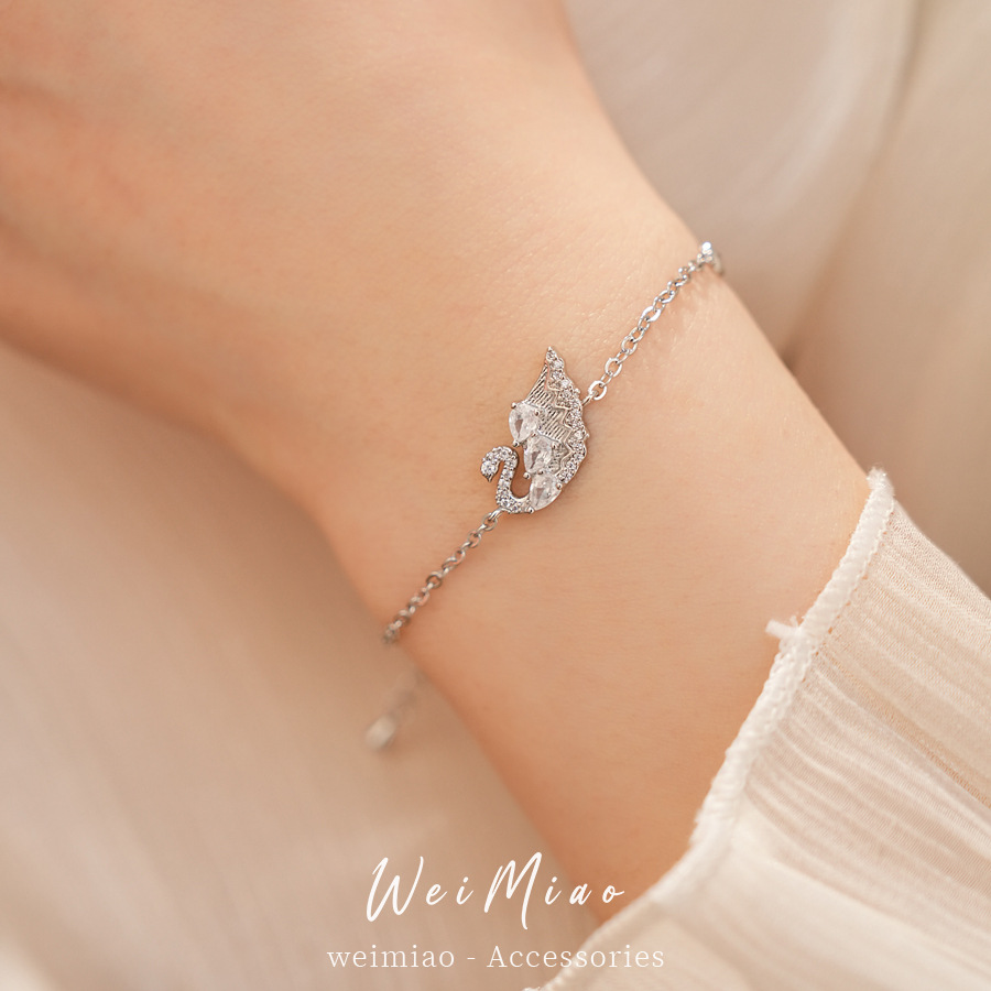 Modas versátiles pulseras de piedra de cisne lujoso ligero nicho pulseras de alta calidad temperamento exquisito joyas personales al por mayor image 3
