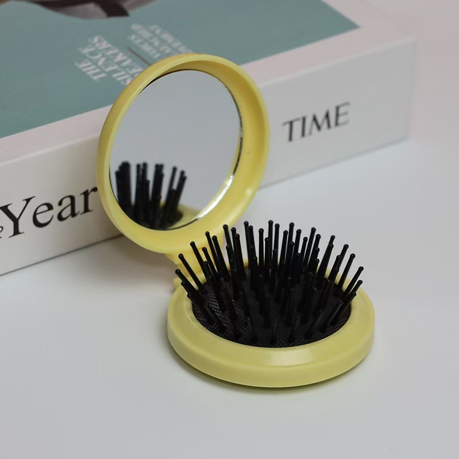 Airbag plegable Pequeño peine con espejo de maquillaje DIY adorable cojín de aire de niña cabeza de masaje portátil peine espejo todo en uno