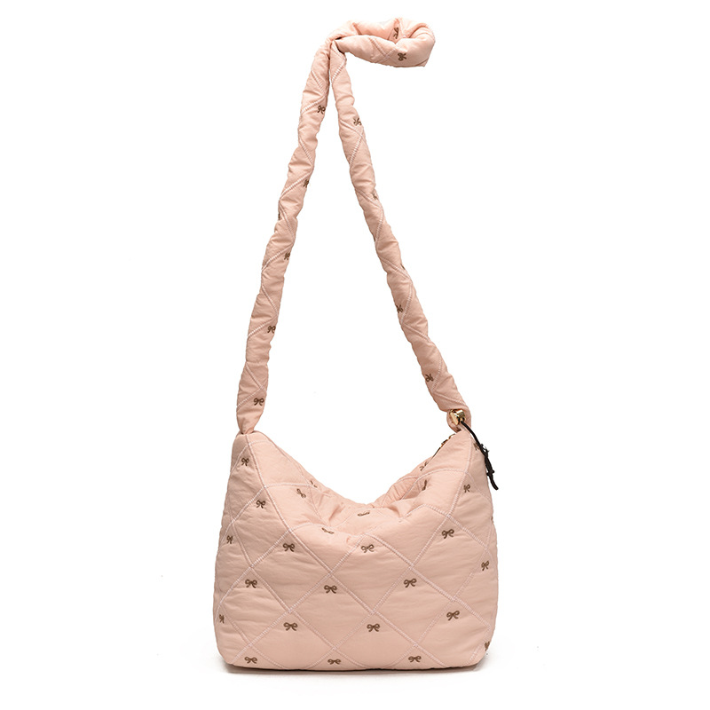 Otoño y invierno de gran capacidad para mujeres 2024 nuevo diseño de arco de bordado ligero de hombro mochila de viaje bolsa