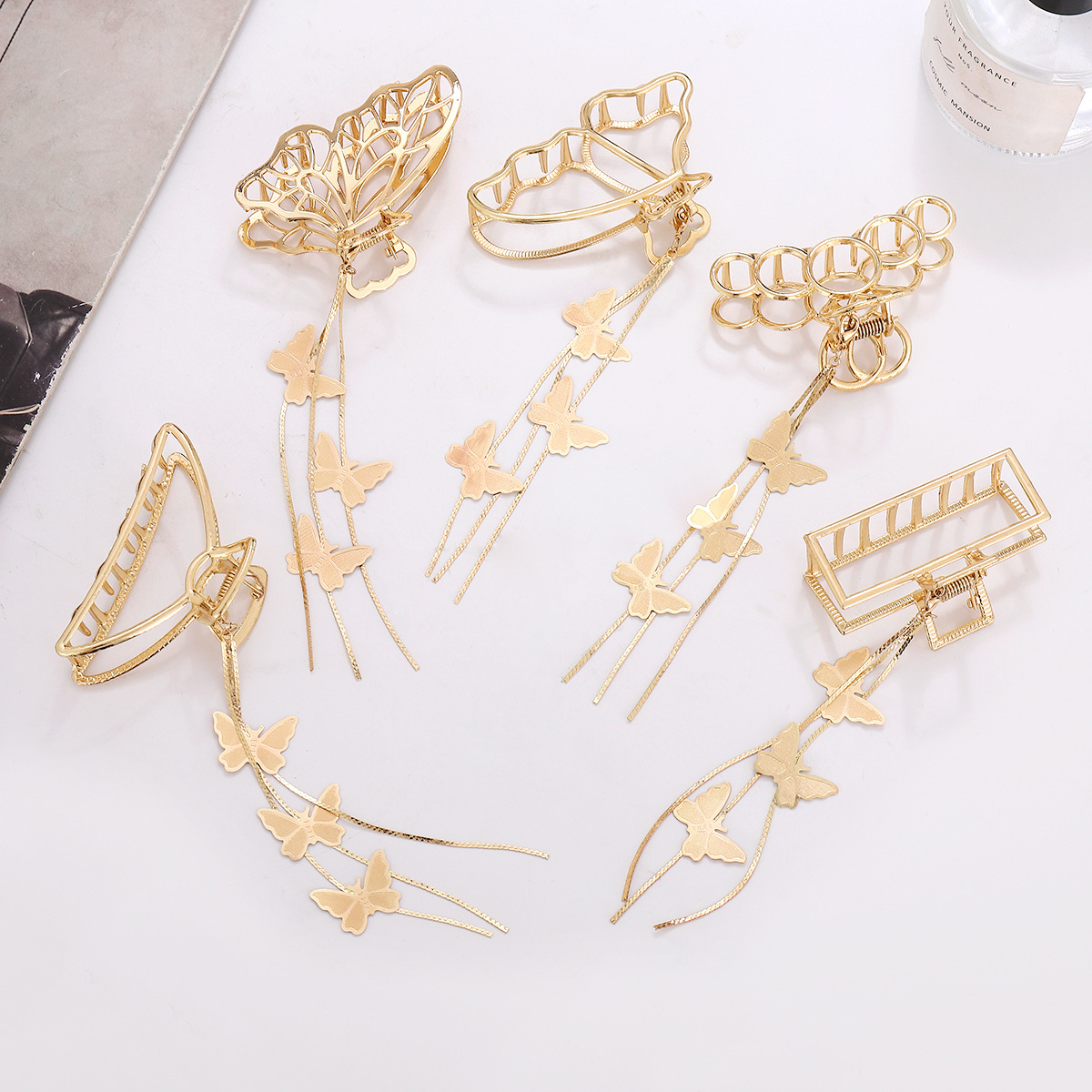 Estilo coreano metal moda hueco clip mariposa horquilla borla colgante tiburón clip hueco espalda Cabeza accesorios para el cabello para las mujeres