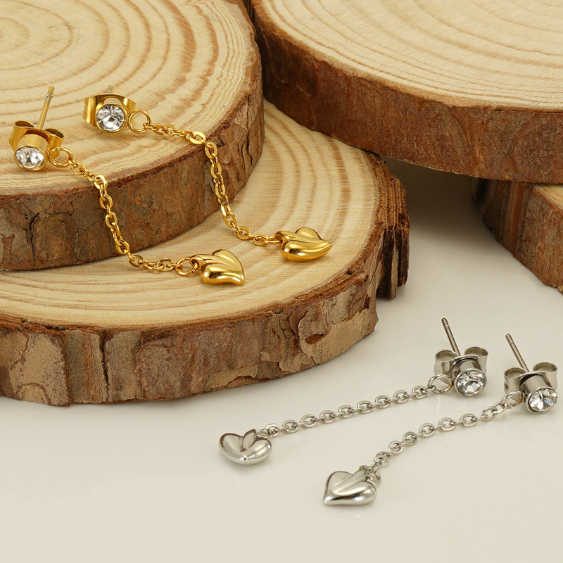 Nueva borla de acero inoxidable transfronteriza pendientes encantadores hembra europea y americana elegante ins luz pendientes de diamantes de lujo pendientes al por mayor