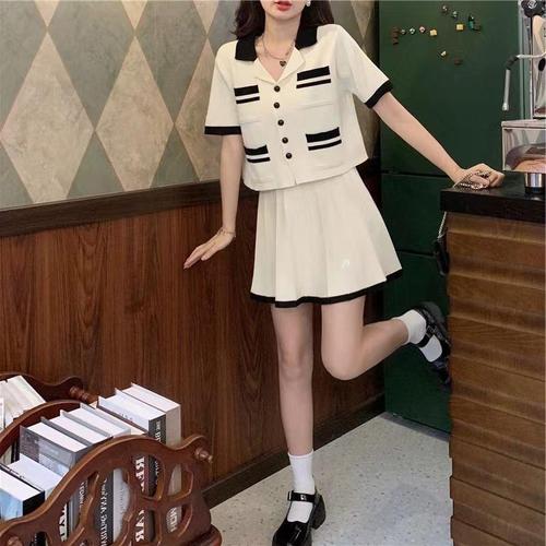 Women's two-piece set: loose short-sleeve summer Chanel-style top + high-waisted pleated mini skirt for a slimmer look