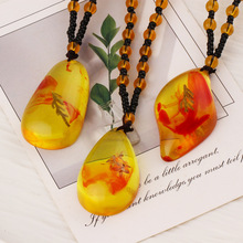 仿琥珀蜜蜡植物化石项链2025创意地摊热卖爆款饰品男款个性毛衣链