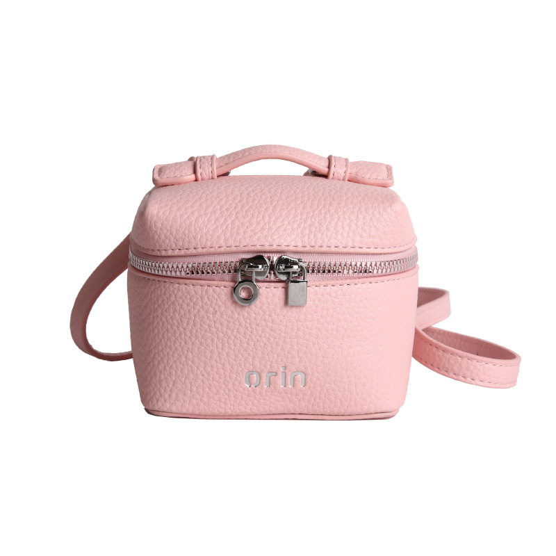 2026 nuevo bolso infantil coreano litchi patrón bolso de caja para hombres y mujeres bolso de cambio de color sólido mini