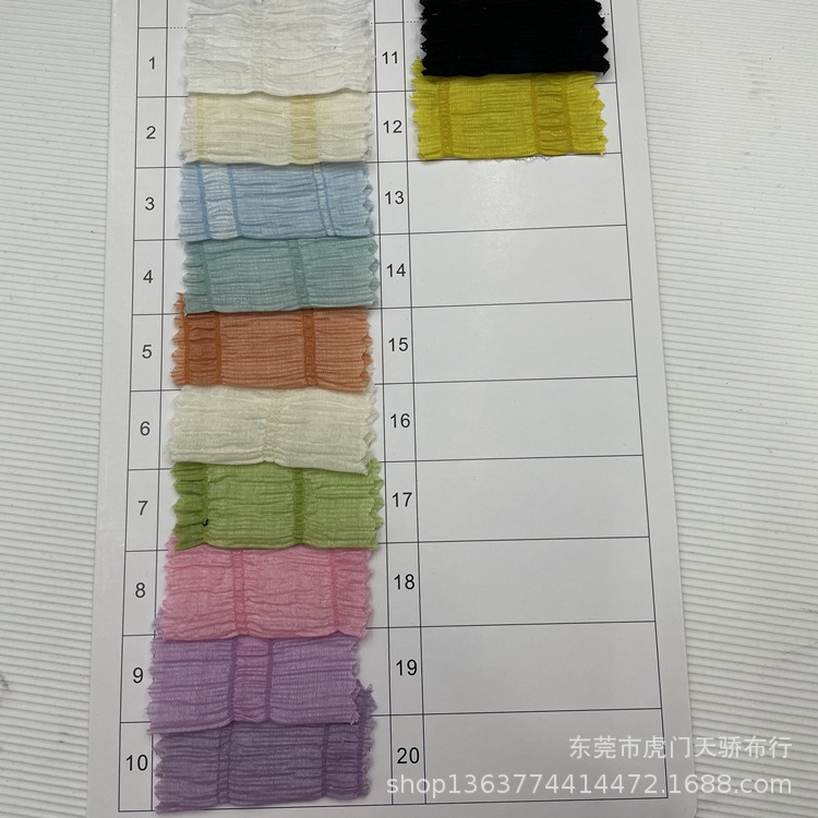 现货供应梭织尼龙涤纶人棉混纺皱皱布梭织时装面料 时尚女装面料