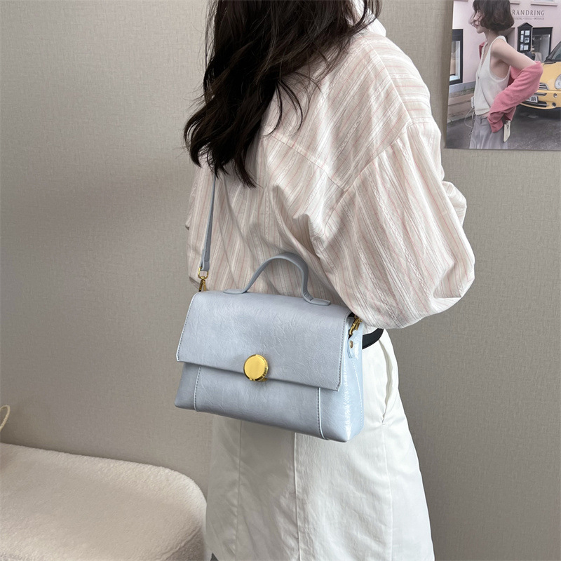 Bolso de moda casual personalizado bolso de tendencia simple diaria 2026 nuevo retro versátil mochila de hombro