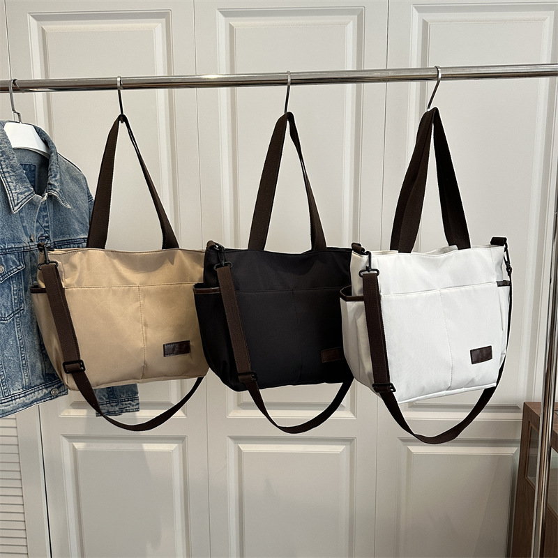 Bolso de lona coreano para mujeres nueva moda ocio de gran capacidad mochila portátil tote simple bolso de hombro para estudiantes