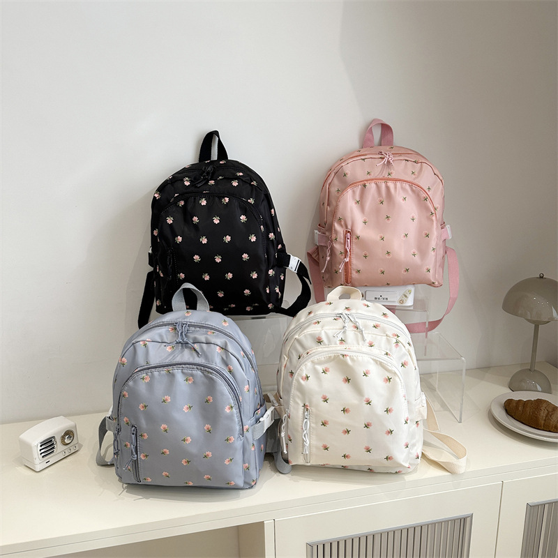 2025 primavera nueva moda coreana simple mochila de hombro casuales flores frescas lindas dulces mochila de estudiantes