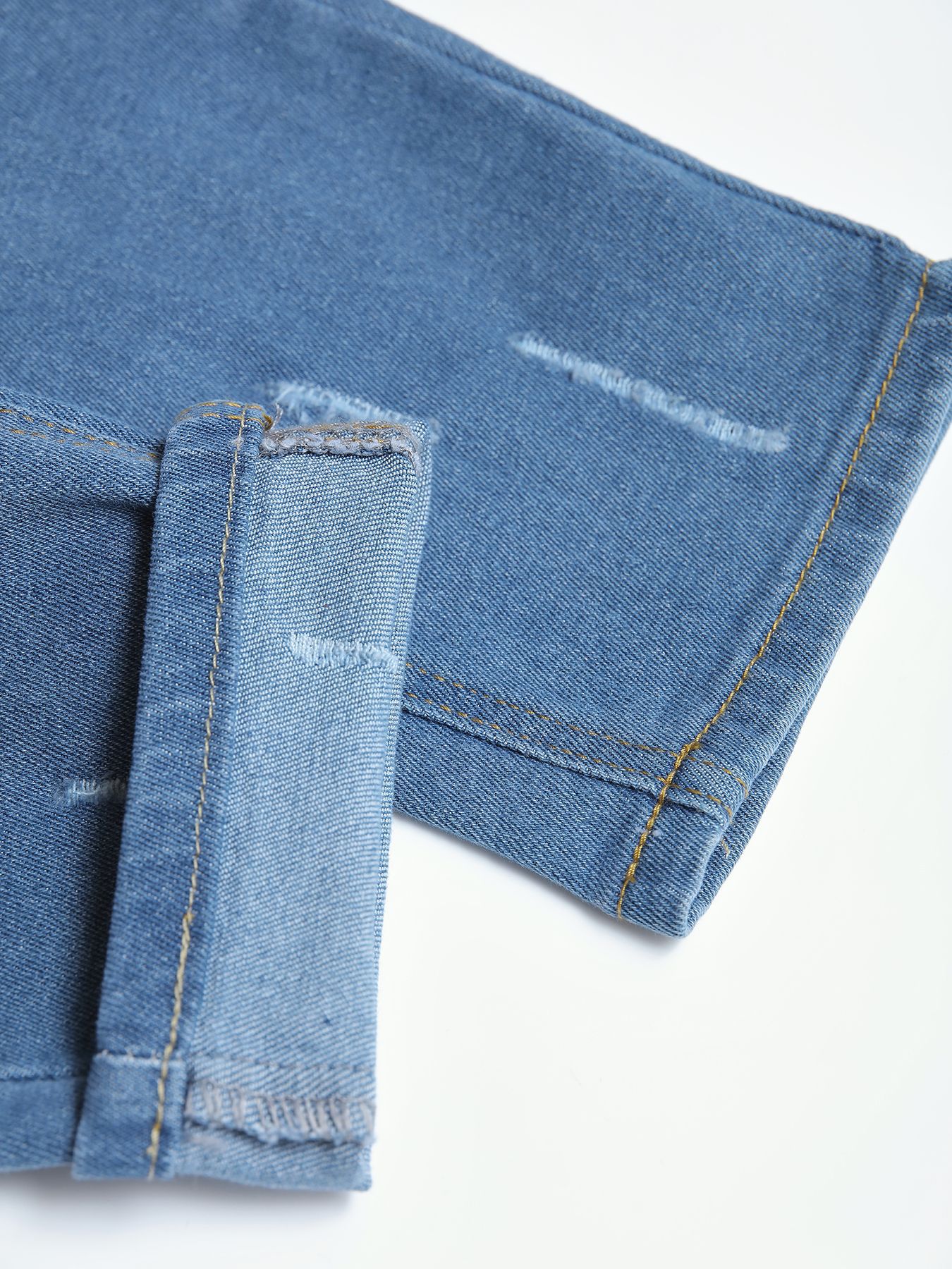 Vaqueros ajustados para jóvenes estadounidenses, pantalones de pie de tendencia para hombres, venta caliente transfronteriza, jeans ajustados rasgados de Amazon
