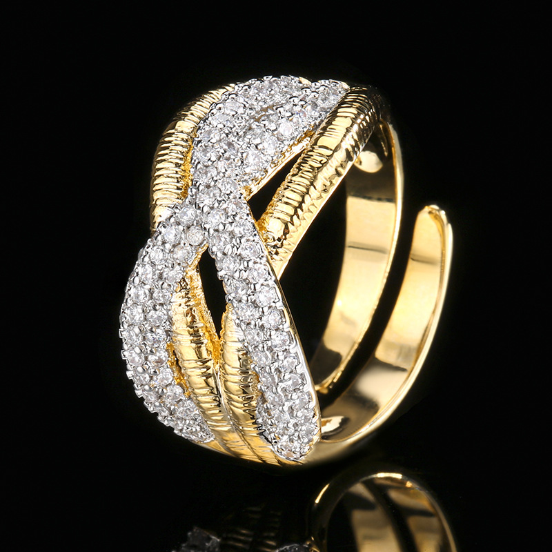 Otoño e invierno nuevo estilo Zhuang Shengsheng joyería fondo de cobre chapado estilo europeo y americano elegante conjunto de anillos de pendientes cepillados de diamantes completos