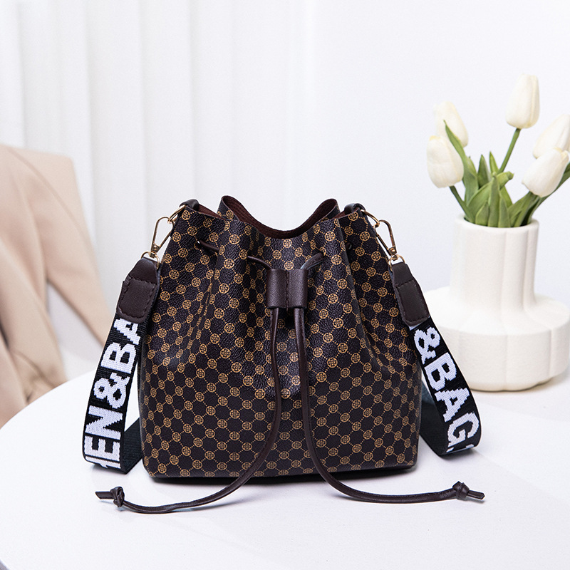 2022 verano nuevo bolso de hombro de moda de mujer bolsa de cubo de flores casuales bolsa de mujer comercio exterior transfronterizo bolsa de mujer bolsa al por mayor