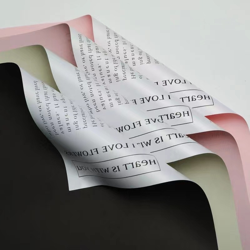 Fábrica de fiestas de flores al por mayor periódico inglés transfronterizo flor de embalaje de flores impermeable doble cara flor de embalaje flor de papel