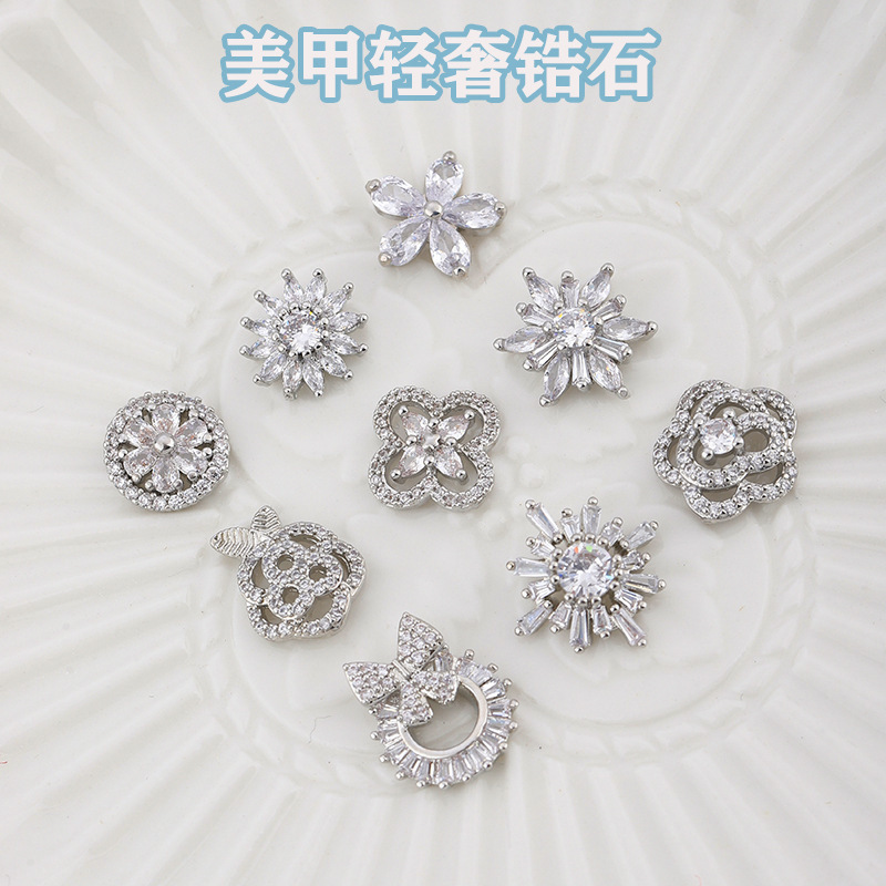 Nail art luxury zircon jewelry high color bride wear armor high-end silver flower nail decorations wholesale Nail art luxury zircon jewelry high color bride wear armor high-end silver flower nail decorations wholesale