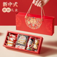 結婚披露宴のお土産のプレゼントの箱の卸売りの喜糖喜餅のプレゼントの箱の完成品は砂糖のセットの贈り物の包みをくわえて婚約して贈り物の箱に帰ります。
