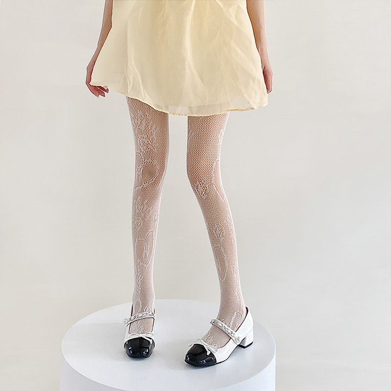 Red de pesca calcetines de primavera y verano delgados huecos grandes flores inins sexy puro amor Jacquard anti-hock pantalones