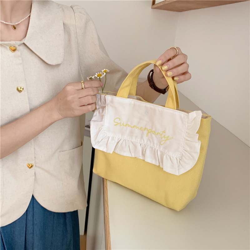 1441 Japanese and Korean chic Sweet ruffled bento Bag, Fresh embroidered hand-held small cloth bag, girl student bag wholesale undefined