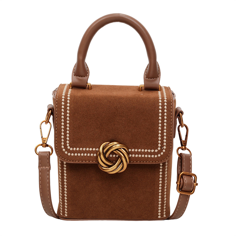 Retro alta sensación vertical bolso de mano pequeña mujer otoño / invierno 2025 nuevo estilo de moda bolso de hombro simple bolso de mochila