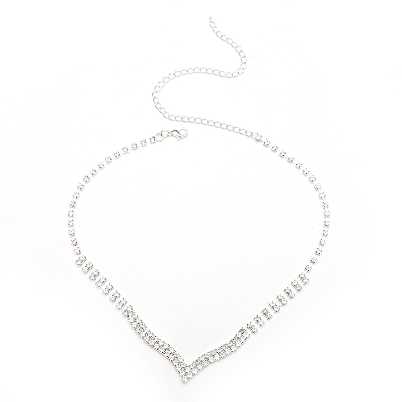 Amazon AliExpress Venta caliente del Partido de tarde joyería moda simple elegante borla rhinestone garra cadena traje