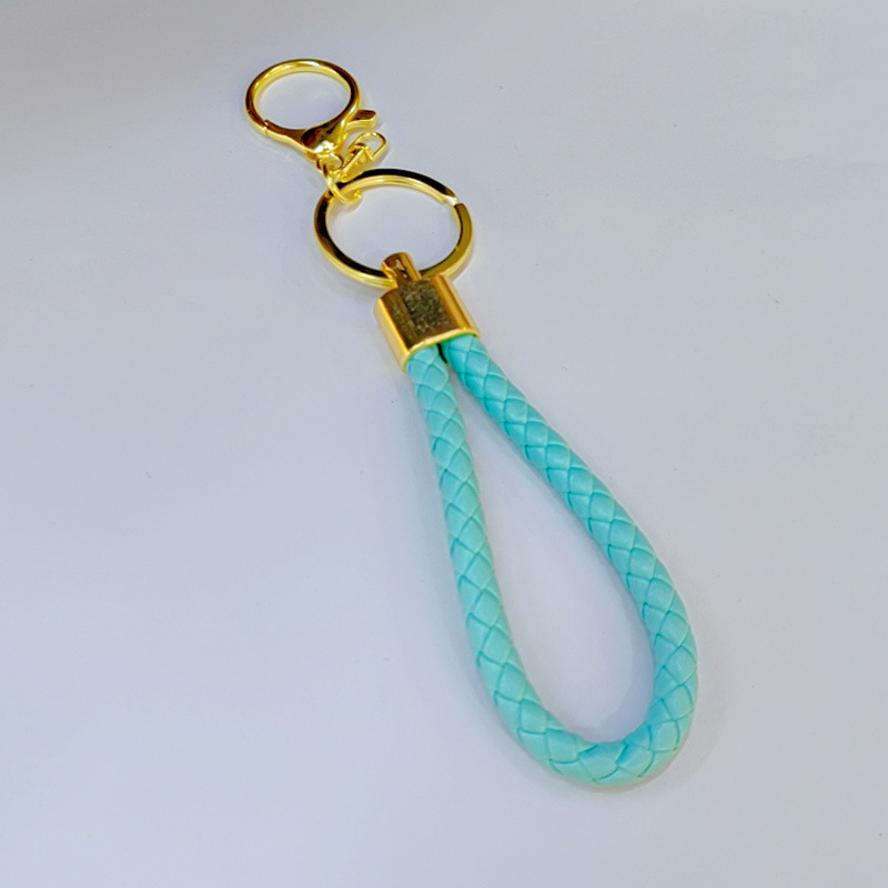 Ronda de la langosta hebilla PU cuero trenzado cuerda llavero hombres y mujeres amor llavero mano cuerda bolsa cordón fábrica directa al por mayor