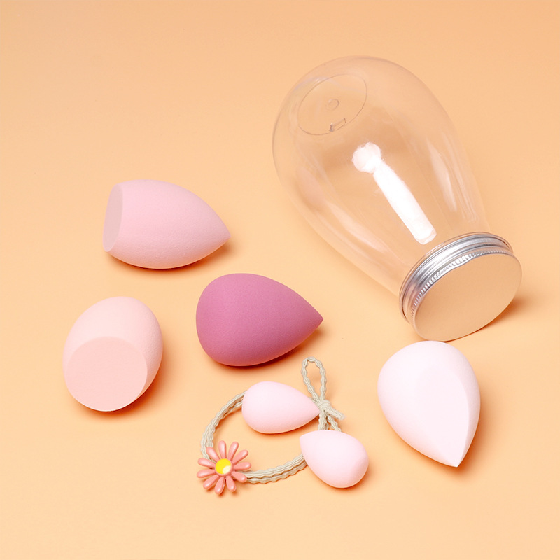 Botella flotante huevo de belleza húmedo y seco de doble uso no comer maquillaje en polvo huevo maquillaje esponja polvo puff traje transfronterizo huevo de maquillaje