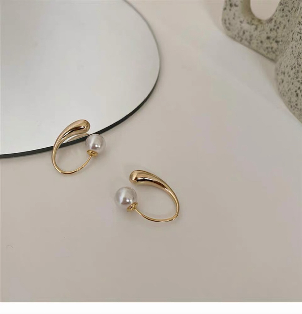 Pendientes de botón con perlas de acero inoxidable mujer_voghion.com