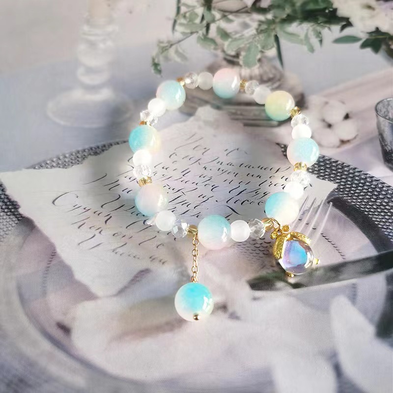 Pulsera de luciérnaga amarilla en polvo azul