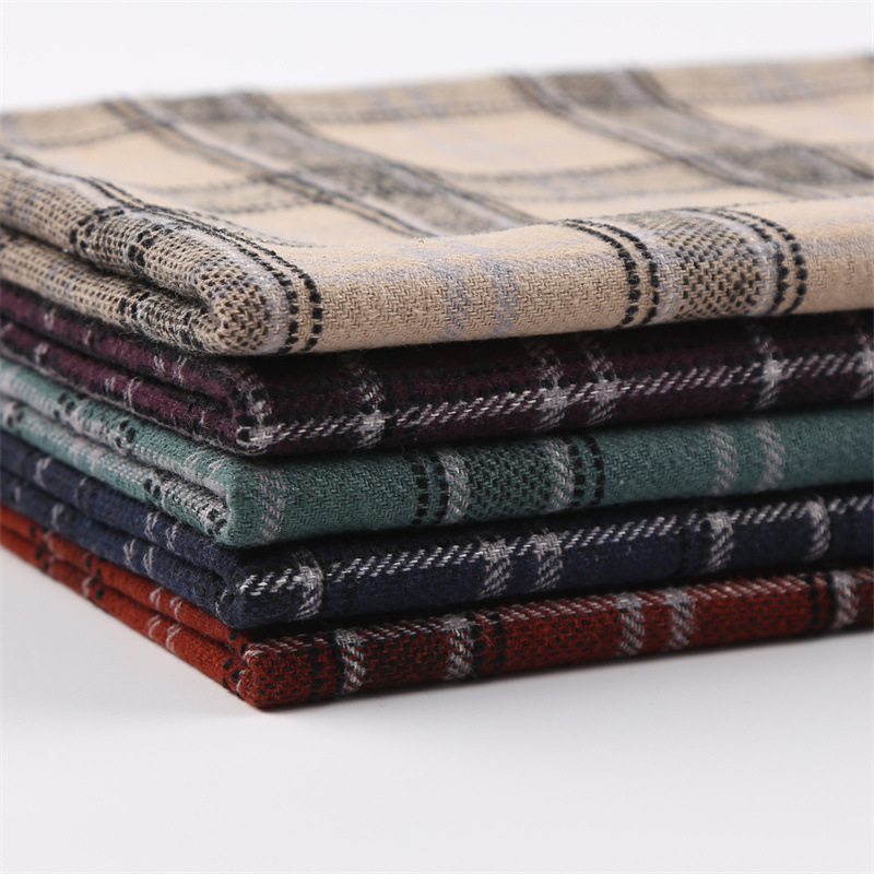 秋冬梭织涤棉提花格子布料 风衣JK百褶裙时装裤装面料磨毛布现货