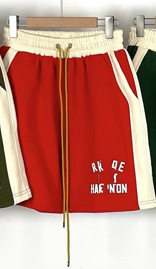 欧米のファッションの色合わせのレトロな半ファスナーのアルファベットのプリントのスタンドカラーとベルベットの男性と女性のストレートのズボンのスーツ|undefined