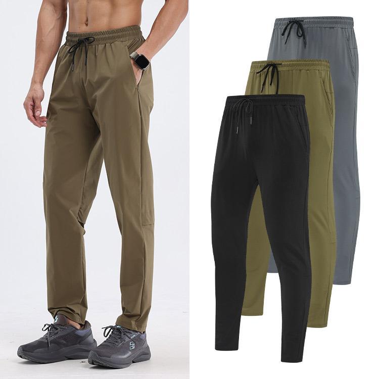 Pantalones deportivos y de ocio Lulu transfronterizos Pantalones de secado rápido para correr al aire libre para hombres Pantalones de entrenamiento de baloncesto sueltos para otoño e invierno